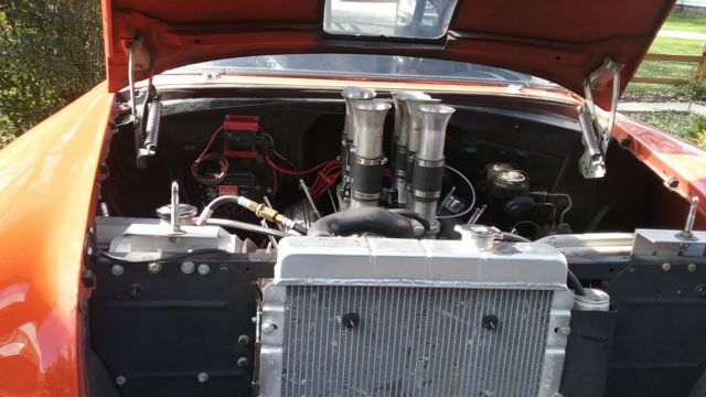 1955 orange Chevrolet Bel Air/150/210 Coupe