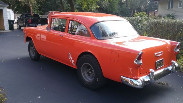 1955 orange Chevrolet Bel Air/150/210 Coupe