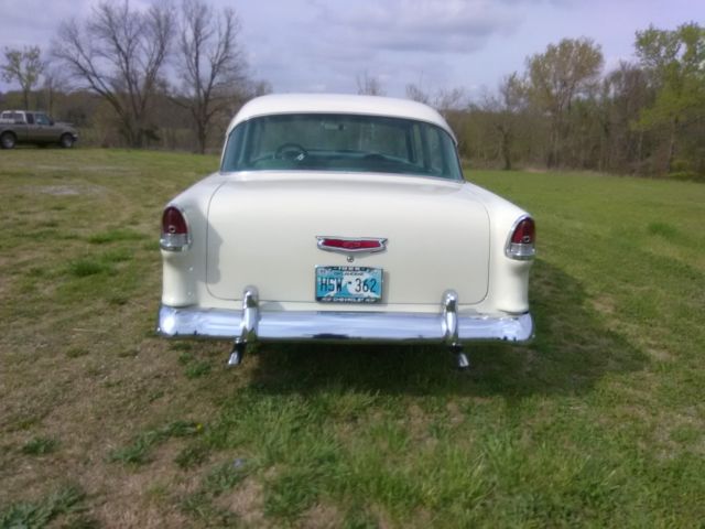 1955 Teal and White Chevrolet Bel Air/150/210 Sedan