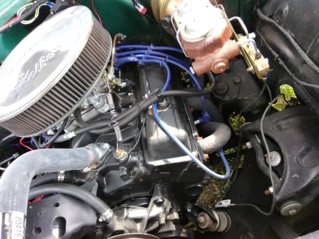 1955 Teal and White Chevrolet Bel Air/150/210 Sedan