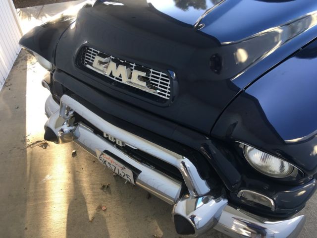 1955 blue GMC Suburban SUV