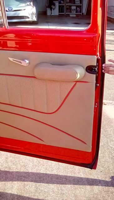 1955 Red Ford F-100 Crew Cab Pickup