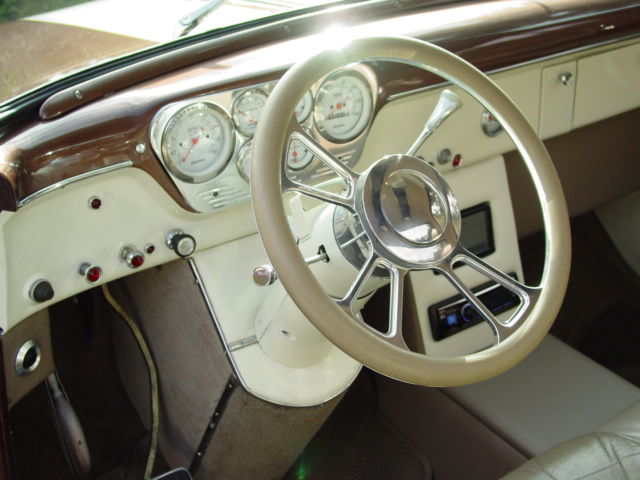 1955 cream/brown Ford F-100 shortbed