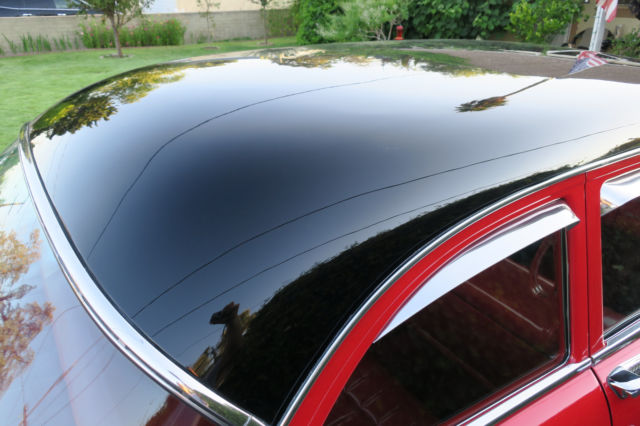 1955 Red Ford Fairlane Coupe