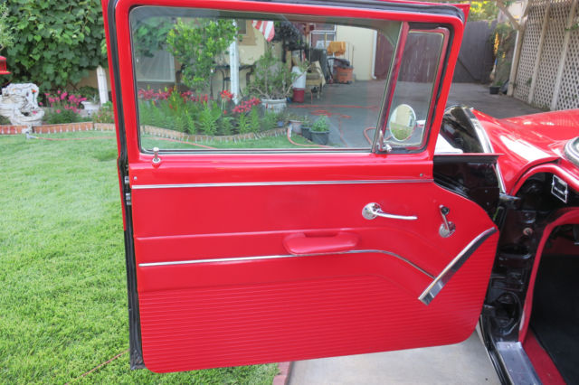 1955 Red Ford Fairlane Coupe