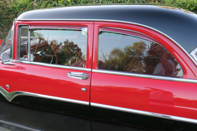1955 Red Ford Fairlane Coupe