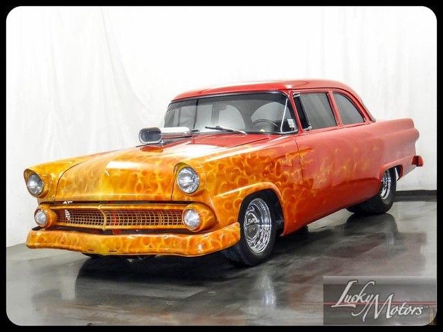 1955 Red Ford Fairlane Sedan