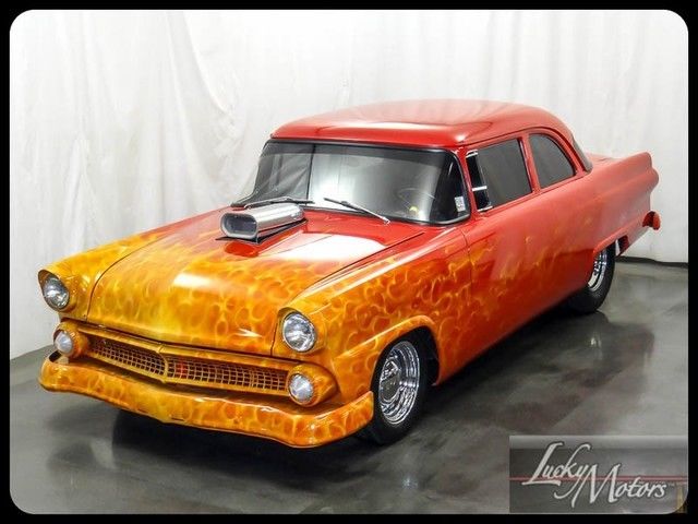 1955 Red Ford Fairlane Sedan