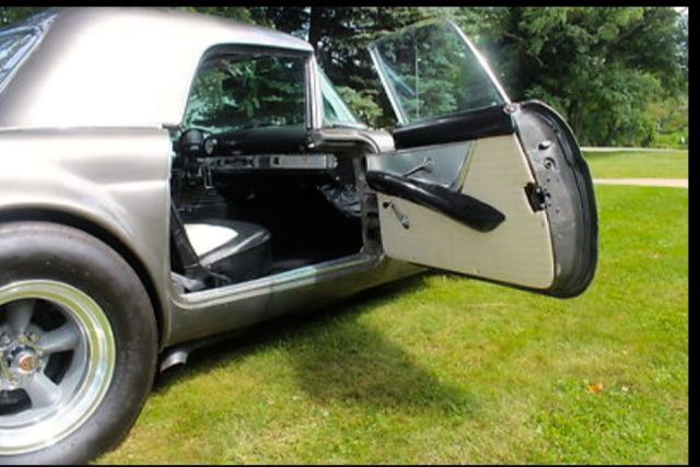 1955 Silver Ford Thunderbird Convertible