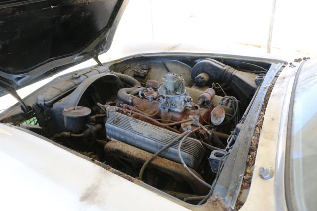 1955 White Ford Thunderbird Convertible