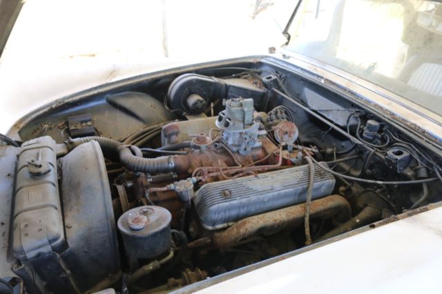 1955 White Ford Thunderbird Convertible