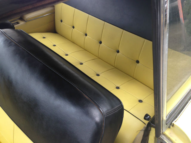 1955 Black and yellow Ford Fairlane hard top