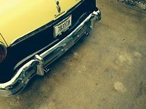 1955 Black and yellow Ford Fairlane hard top