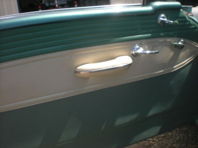 1955 turquise/white Oldsmobile Eighty-Eight Coupe