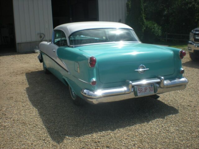 1955 turquise/white Oldsmobile Eighty-Eight Coupe