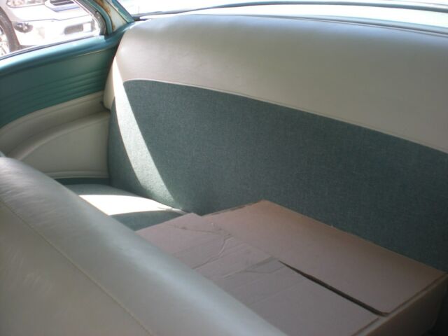 1955 turquise/white Oldsmobile Eighty-Eight Coupe