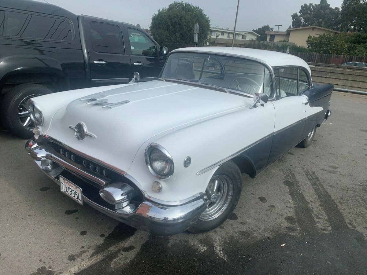 1955 turquise/white Oldsmobile Eighty-Eight 2 door hard top