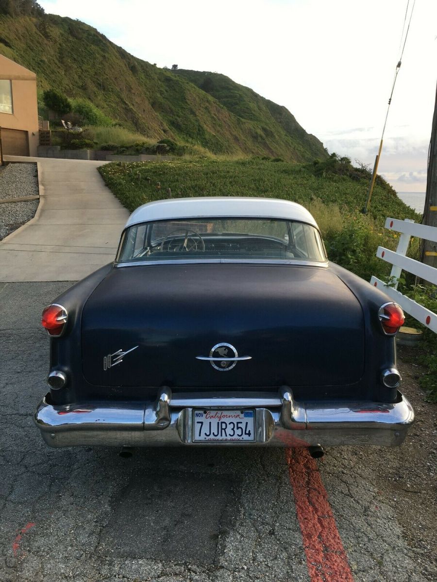1955 turquise/white Oldsmobile Eighty-Eight 2 door hard top