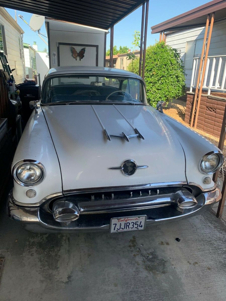 1955 turquise/white Oldsmobile Eighty-Eight 2 door hard top