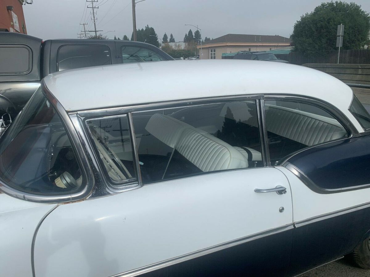 1955 turquise/white Oldsmobile Eighty-Eight 2 door hard top