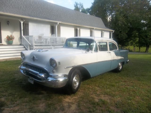 1955 Blue and White Oldsmobile Eighty-Eight Sedan
