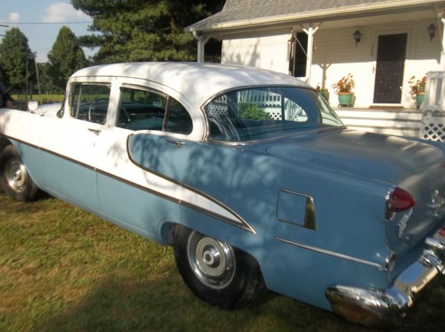 1955 Blue and White Oldsmobile Eighty-Eight Sedan