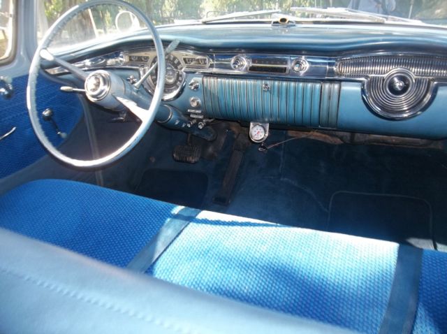 1955 Blue and White Oldsmobile Eighty-Eight Sedan