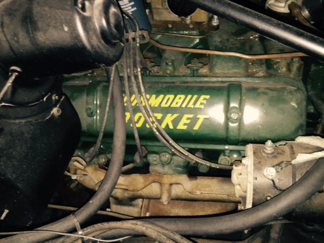 1955 White with pink marbled scallops and blue accents Oldsmobile Eighty-Eight Coupe