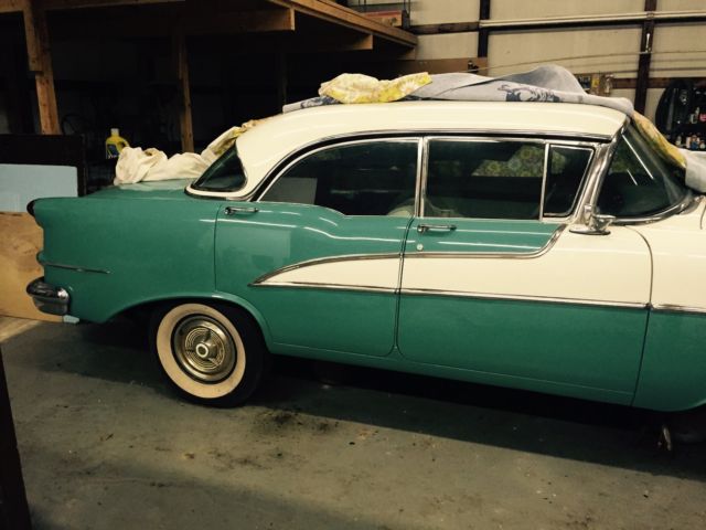 1955 White with pink marbled scallops and blue accents Oldsmobile Eighty-Eight Coupe