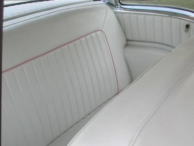 1955 White with pink marbled scallops and blue accents Oldsmobile Eighty-Eight Coupe