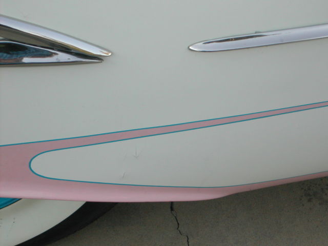 1955 White with pink marbled scallops and blue accents Oldsmobile Eighty-Eight Coupe
