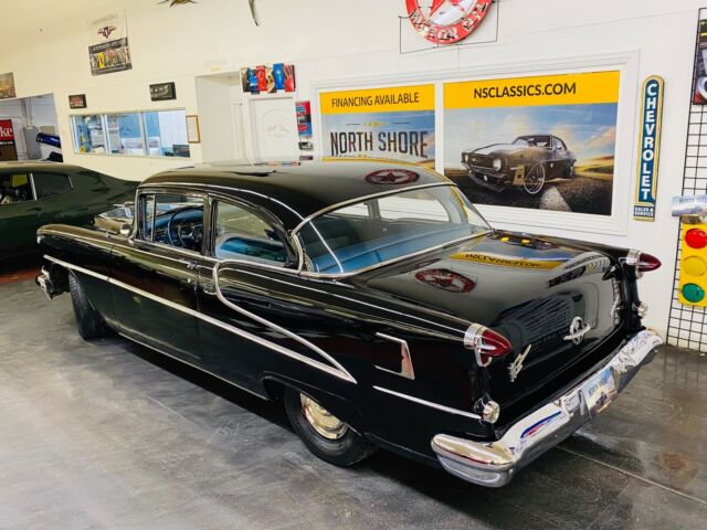 1955 Black Oldsmobile Eighty-Eight Coupe