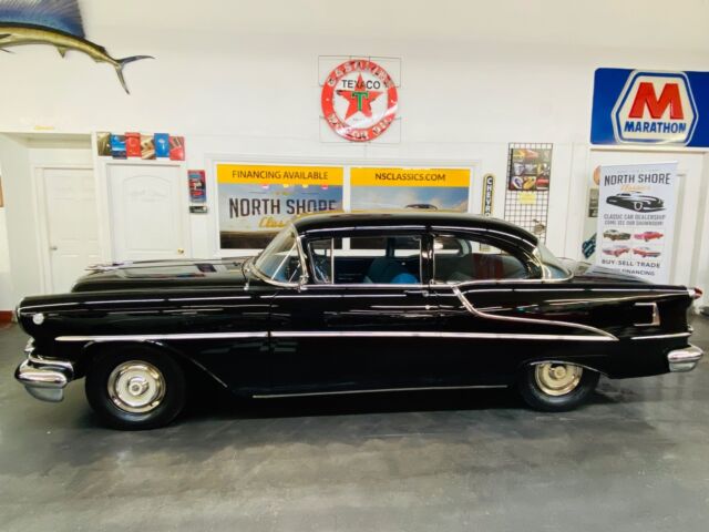 1955 Black Oldsmobile Eighty-Eight Coupe