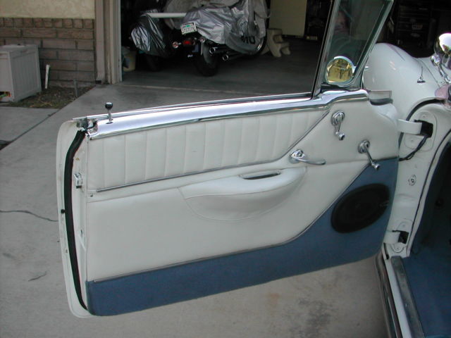 1955 White with pink marbled scallops and blue accents Oldsmobile Eighty-Eight Coupe