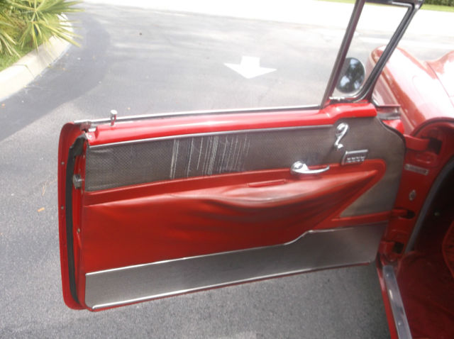 1955 Red Oldsmobile Ninety-Eight Coupe