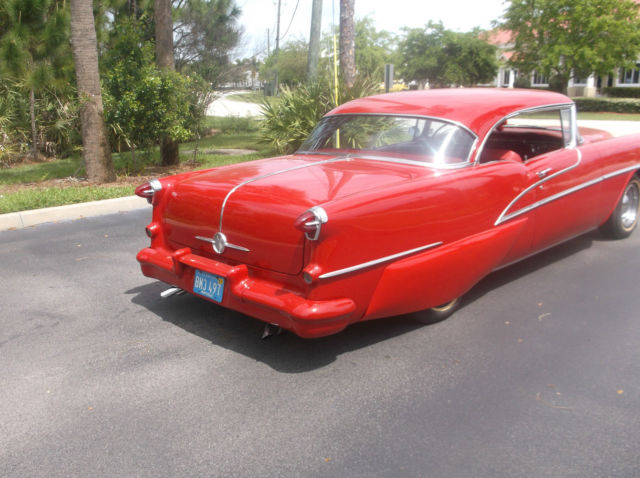 1955 Red Oldsmobile Ninety-Eight Coupe