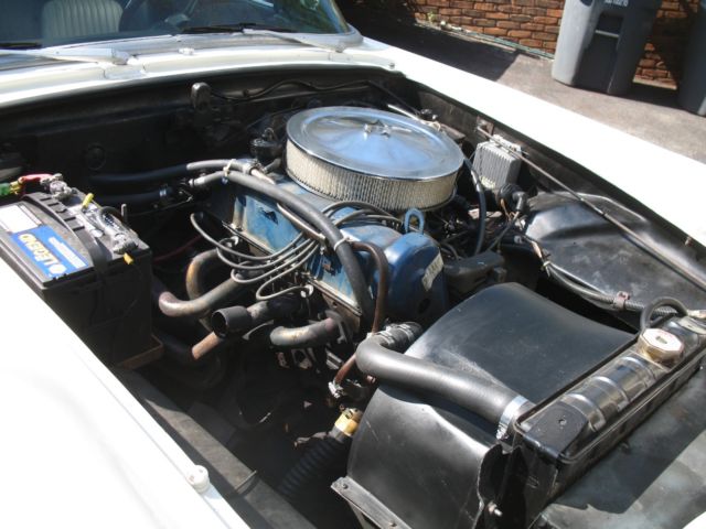1982 Red/white Ford Thunderbird Convertible