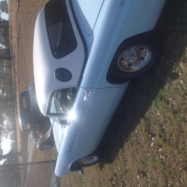 1955 baby blue Ford Thunderbird 2 door conv