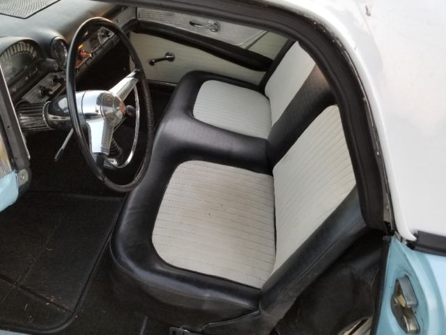 1955 baby blue Ford Thunderbird 2 door conv