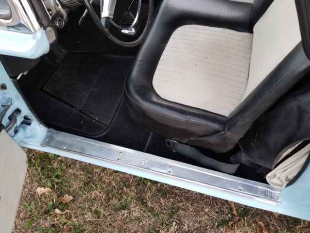 1955 baby blue Ford Thunderbird 2 door conv