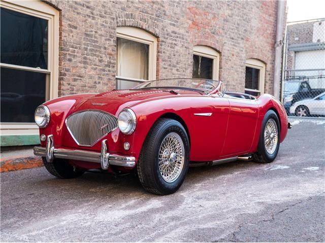 1956 Red Austin Healey 100M LeMans Convertable