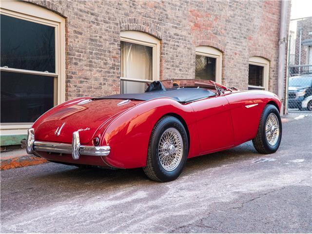 1956 Red Austin Healey 100M LeMans Convertable