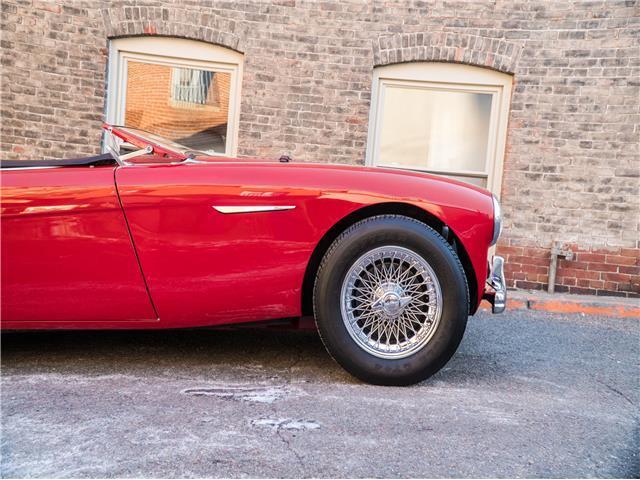 1956 Red Austin Healey 100M LeMans Convertable