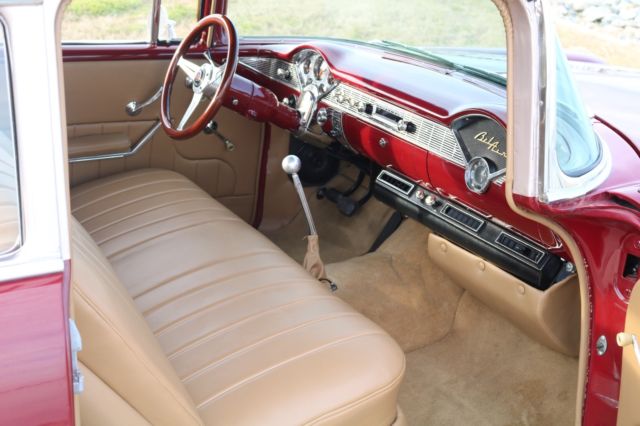 1956 maroon Chevrolet Bel Air/150/210 Coupe
