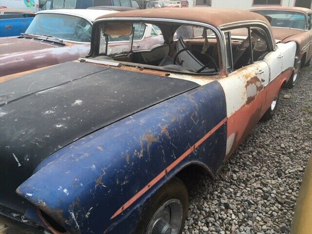 1956 Red and White Chevrolet Bel Air/150/210 4 D