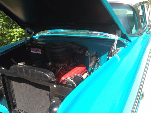 1956 blue and white Chevrolet Bel Air/150/210 4 Door