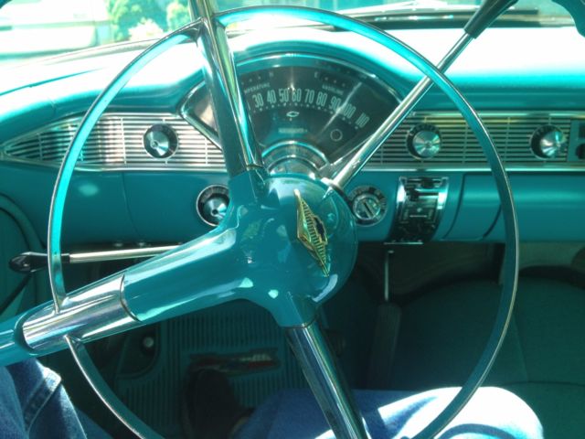 1956 blue and white Chevrolet Bel Air/150/210 4 Door