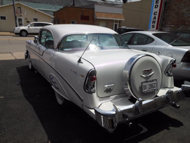 1956 White w/ purple ghost flames Chevrolet Bel Air/150/210 Sedan