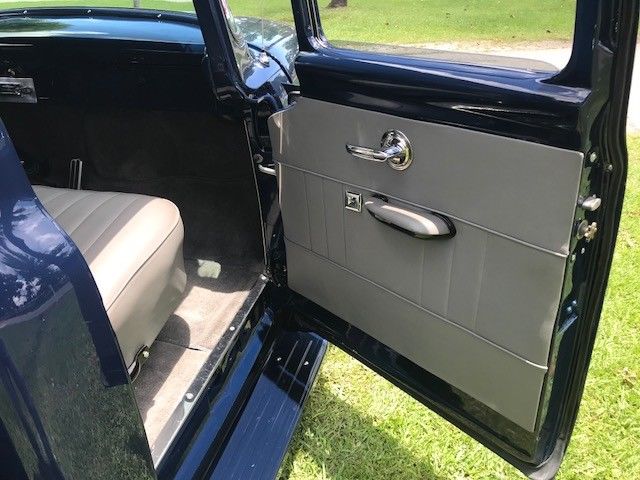 1956 blue Ford F-100 Extended Crew Cab Pickup