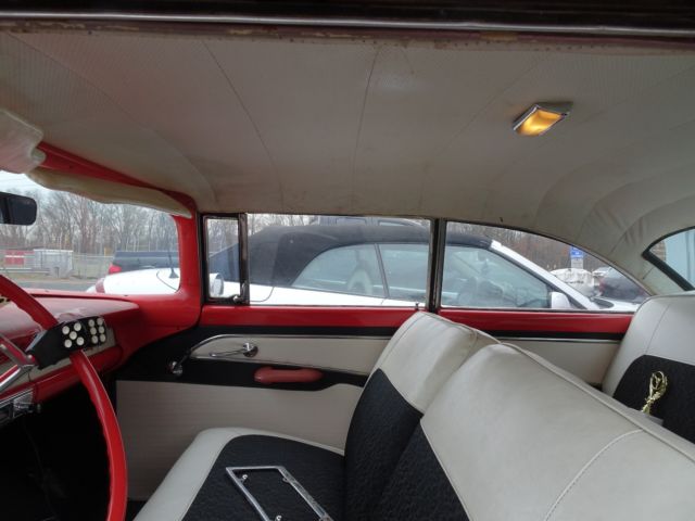 1956 Red Ford Fairlane Coupe